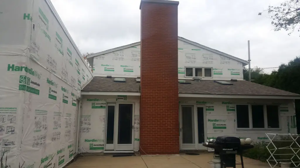 James Hardie siding installation in progress