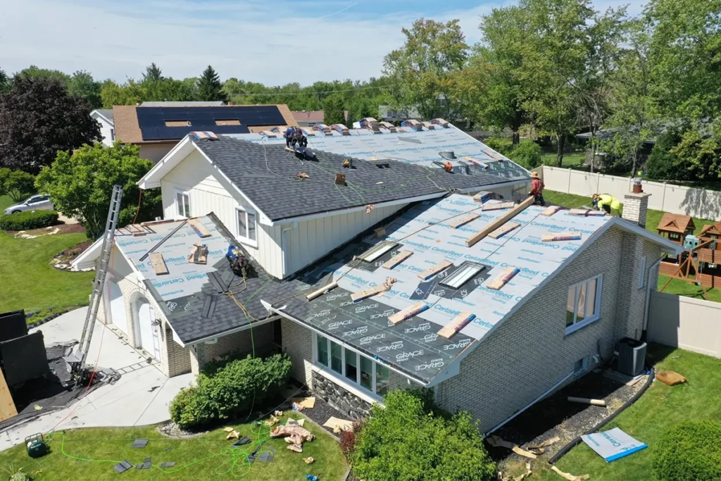 Aerial view of a roof replacement in progress on an Orland Park home
