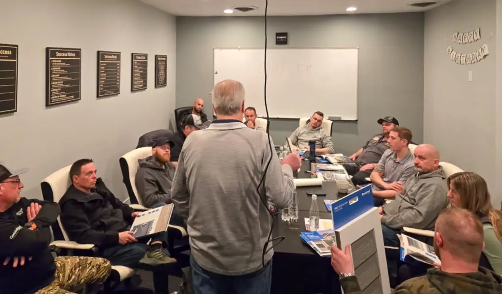 Roofing crew members in a CertainTeed training session