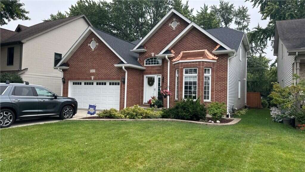 CertainTeed Landmark Moire Black roof replacement at 1023 Oxford Street in Downers Grove, IL
