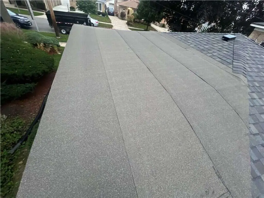 CertainTeed Landmark Driftwood roof with siding and gutters on Plainfield Avenue in Norridge, IL