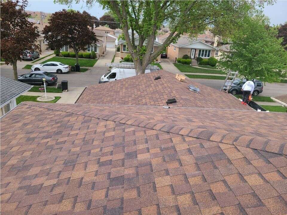 Full exterior project with roofing, siding, gutters, windows and doors on West Maple Avenue in Norridge, IL
